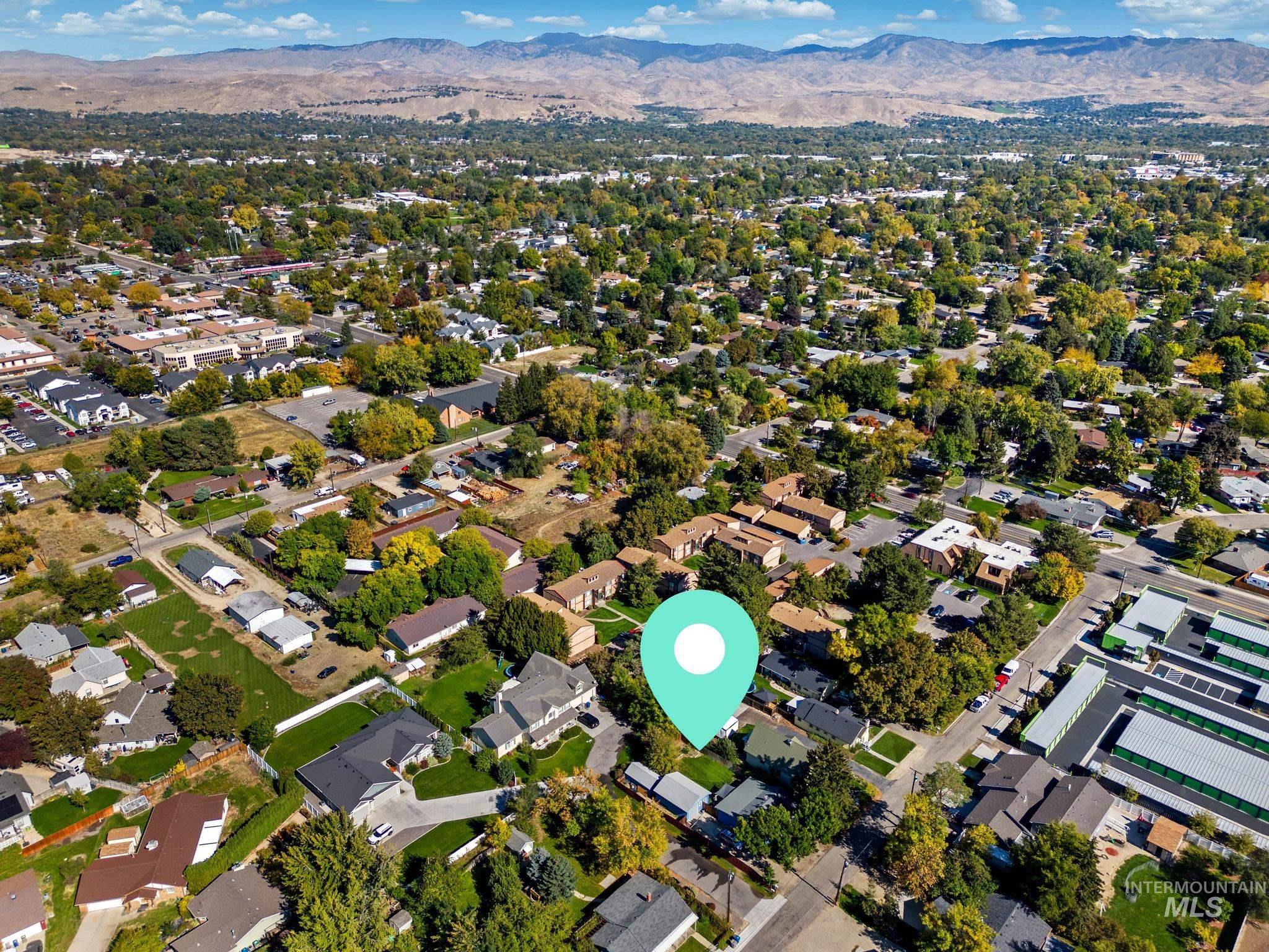7514 West Swift Lane Boise, ID 83704 - Photo 33 of 46 View of property location featuring a mountainous background and nearby suburban area