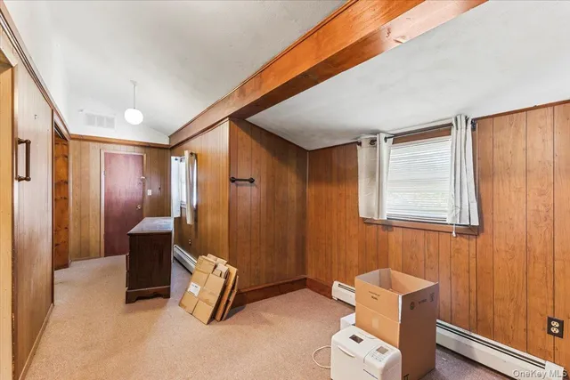 a view of an entryway with furniture and livingroom view
