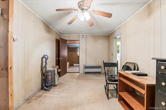 a view of a porch with wooden floor