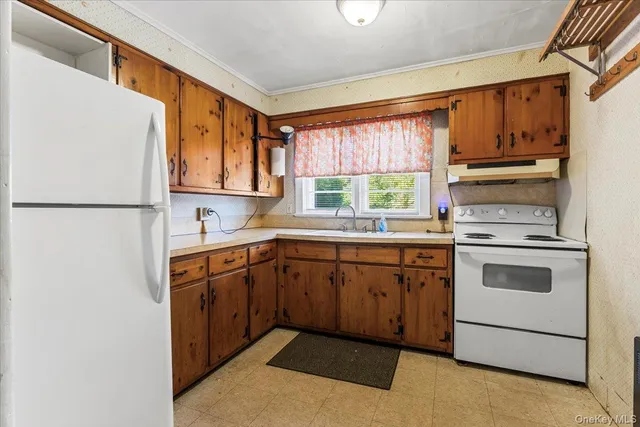 a view of a hallway with a bedroom