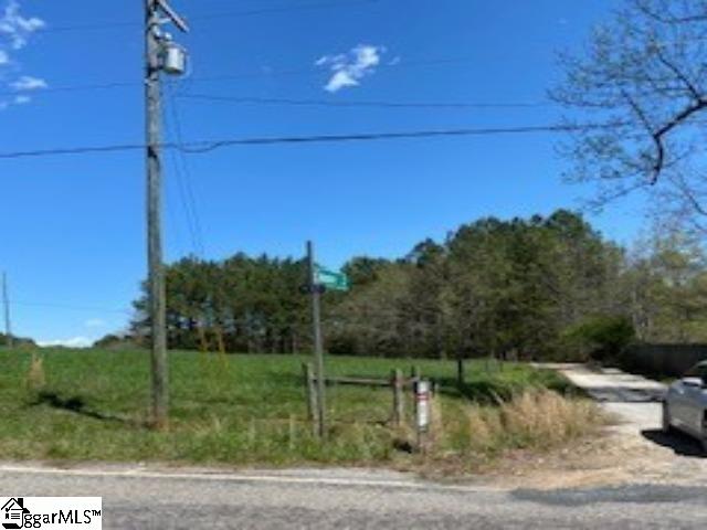 Turn on this road to drive to the property