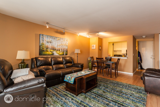 Undisclosed Address Chicago, IL 60614 - Photo 3 of 12 a living room with furniture and a large window