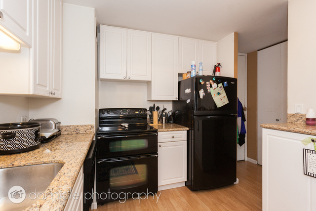 Undisclosed Address Chicago, IL 60614 - Photo 9 of 12 a kitchen with a stove and a refrigerator