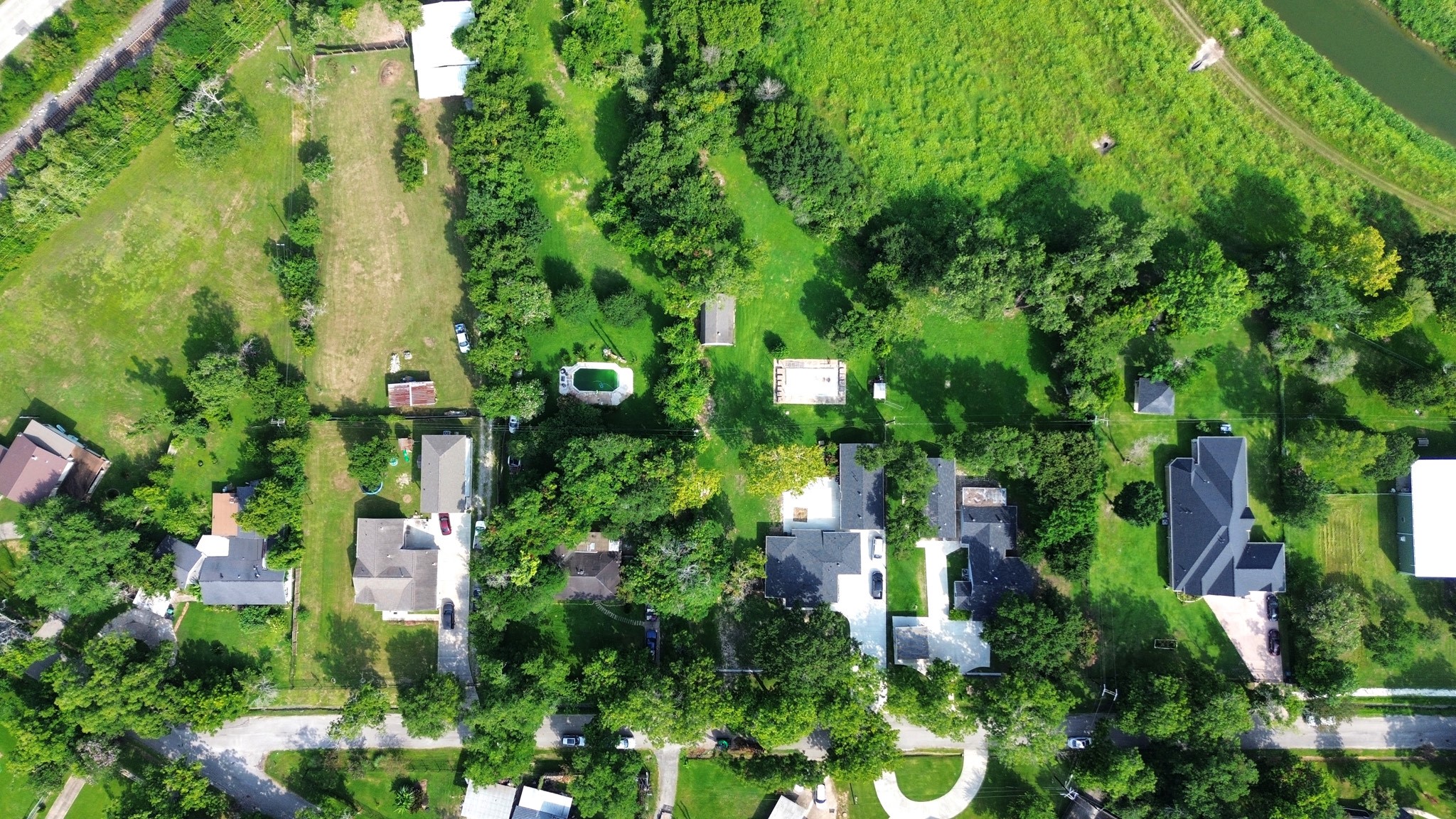 6735 Alpine Drive Houston, TX 77061 - Photo 6 of 6 an aerial view of residential houses with outdoor space and trees