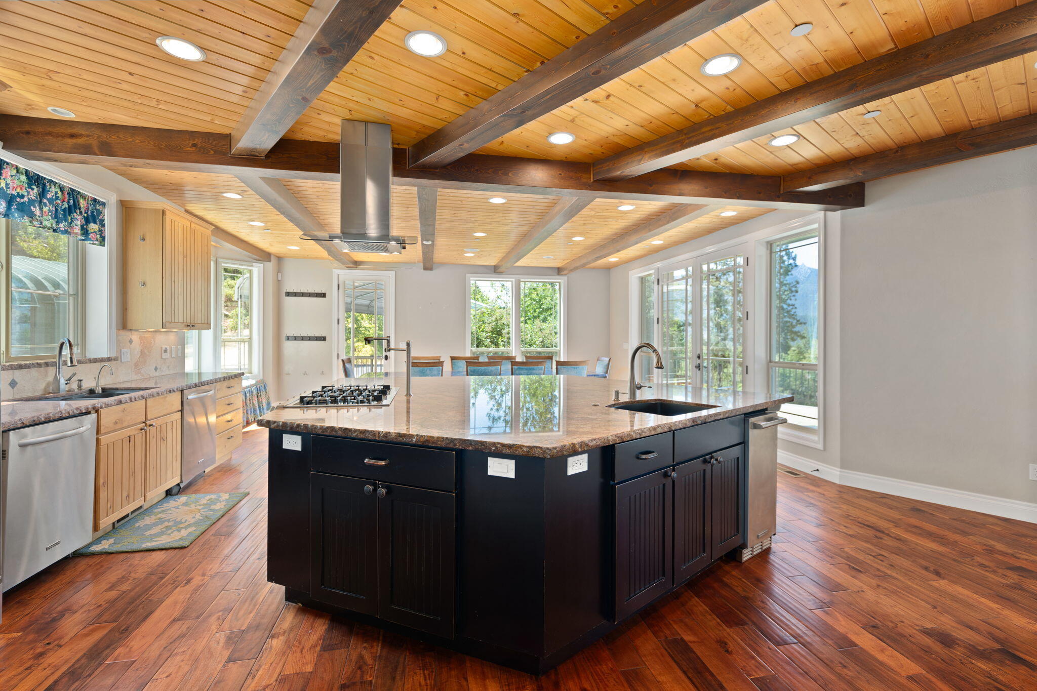 7304 North Applegate Road Grants Pass, OR 97527 - Photo 6 of 87 Beautiful wood beams inset lighting Kitchen looking toward dining area.