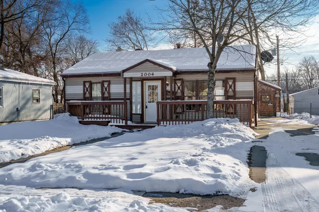 a view of a house with snow on the ground