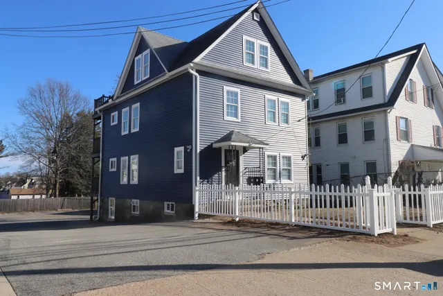 a front view of a house with a porch