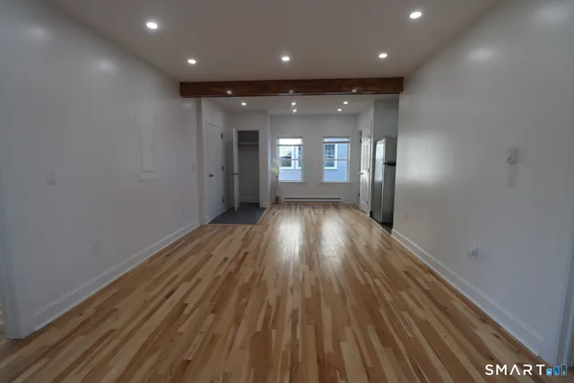 a view of hallway with a window