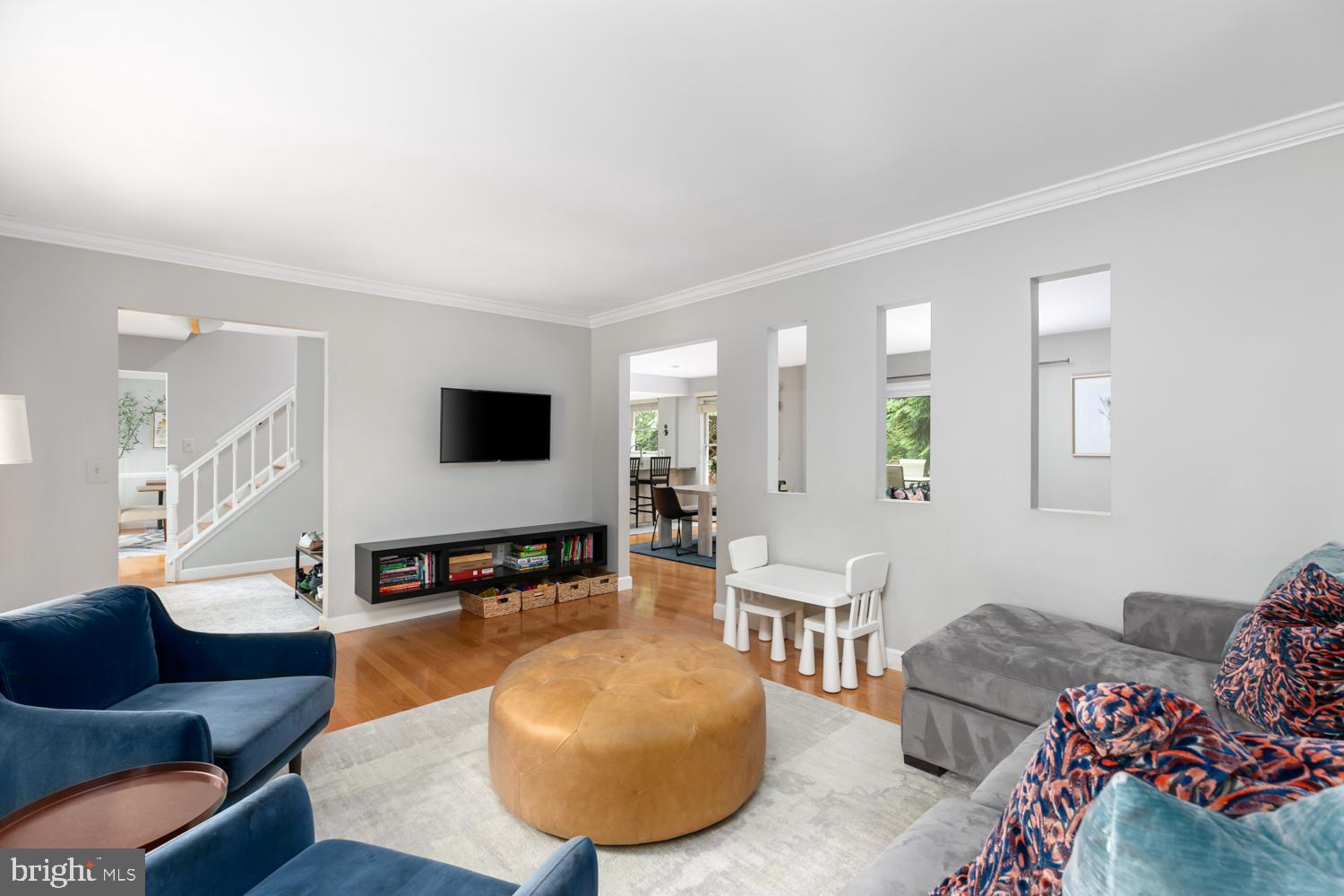 11603 Deer Forest Road Reston, VA 20194 - Photo 12 of 38 a living room with furniture and a flat screen tv