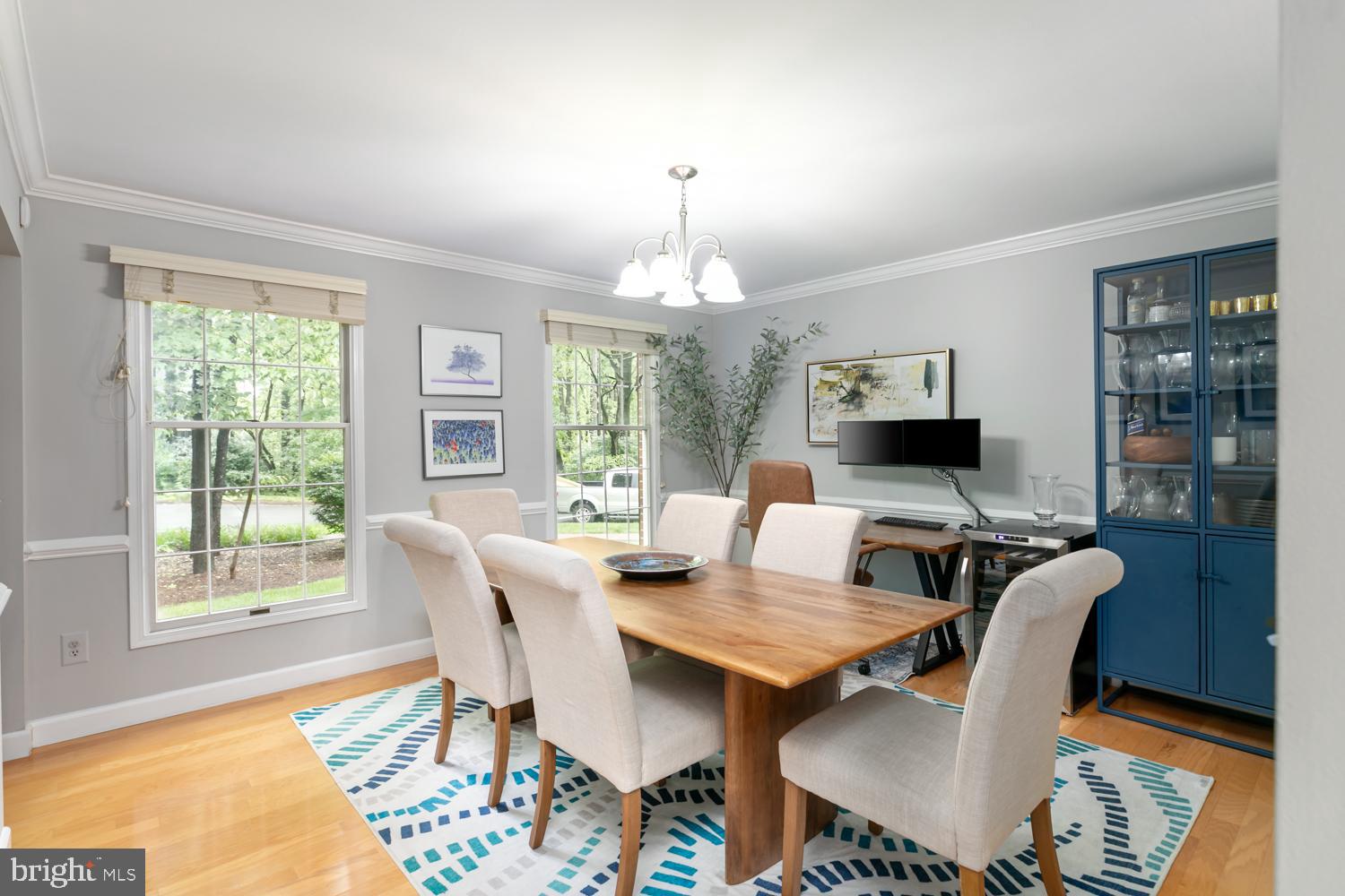 11603 Deer Forest Road Reston, VA 20194 - Photo 13 of 38 a view of a dining room with furniture window and wooden floor