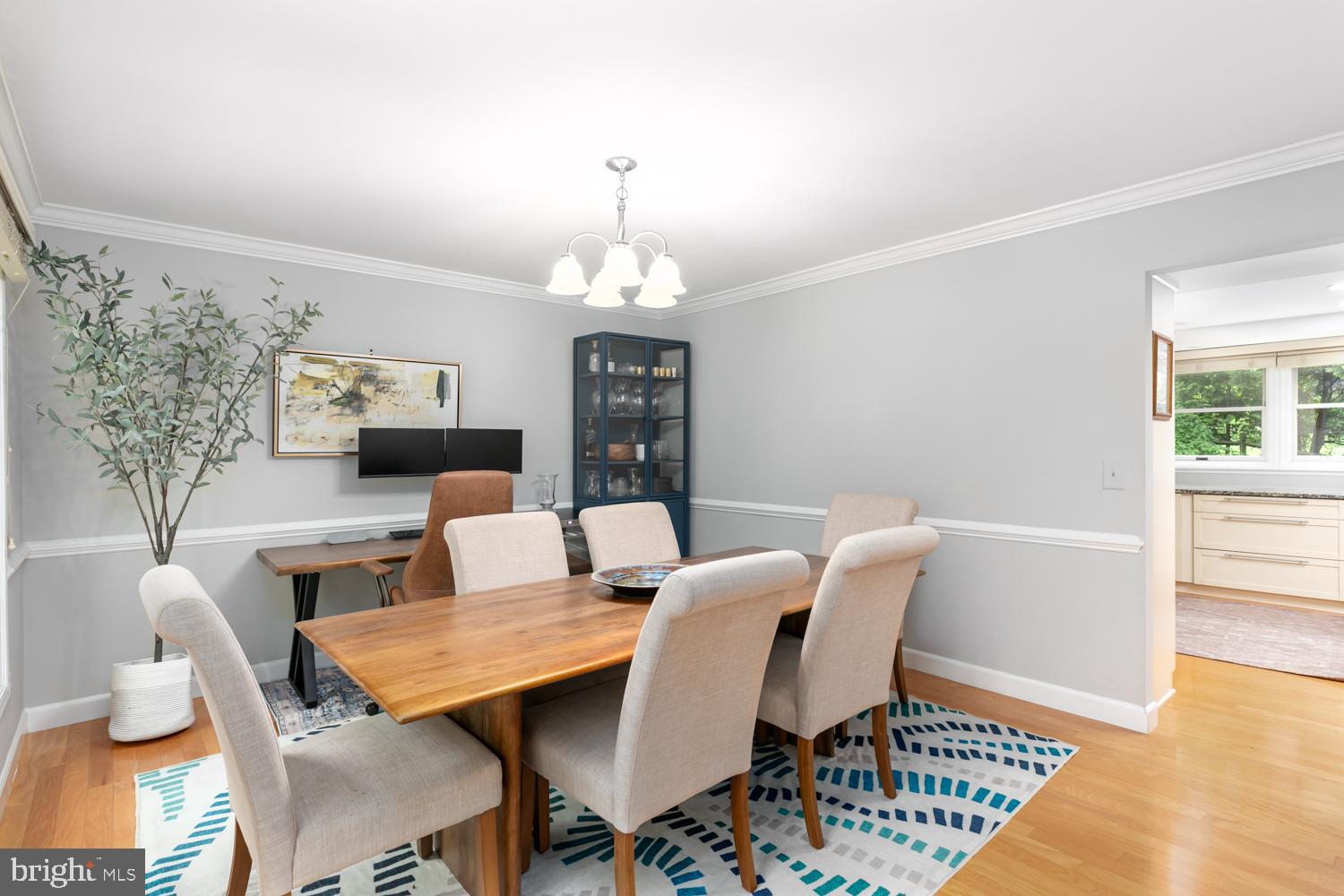 11603 Deer Forest Road Reston, VA 20194 - Photo 14 of 38 a view of a dining room with furniture window and wooden floor