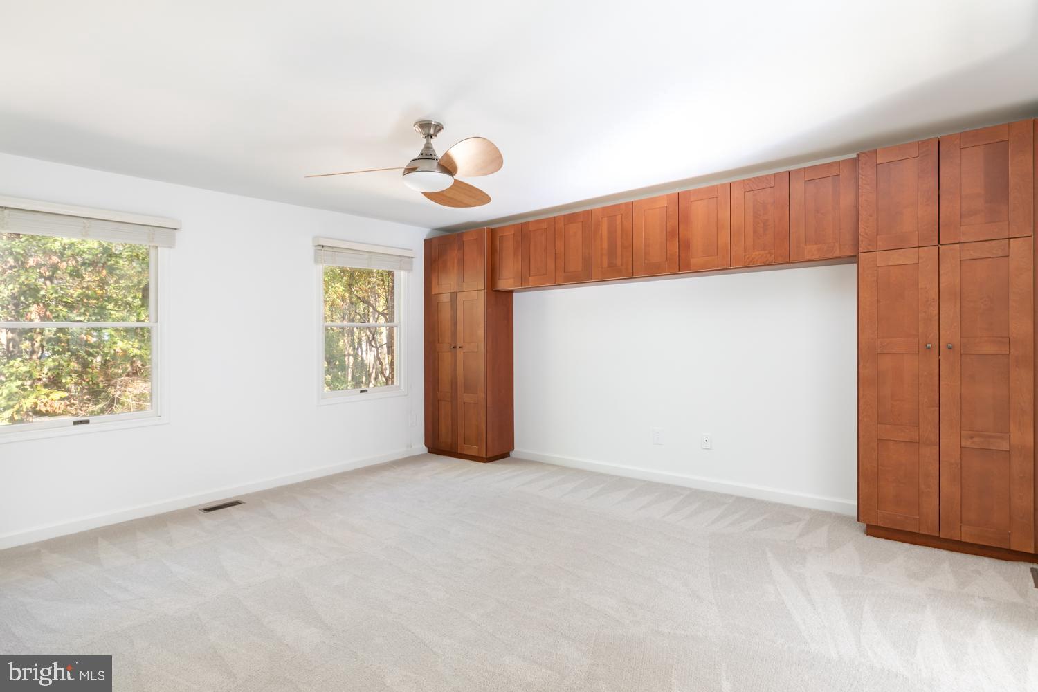 11603 Deer Forest Road Reston, VA 20194 - Photo 16 of 38 an empty room with windows