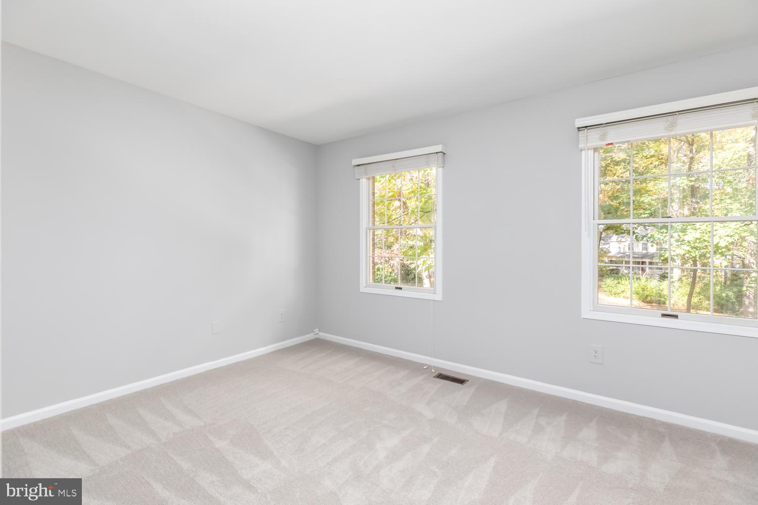11603 Deer Forest Road Reston, VA 20194 - Photo 21 of 38 an empty room with windows