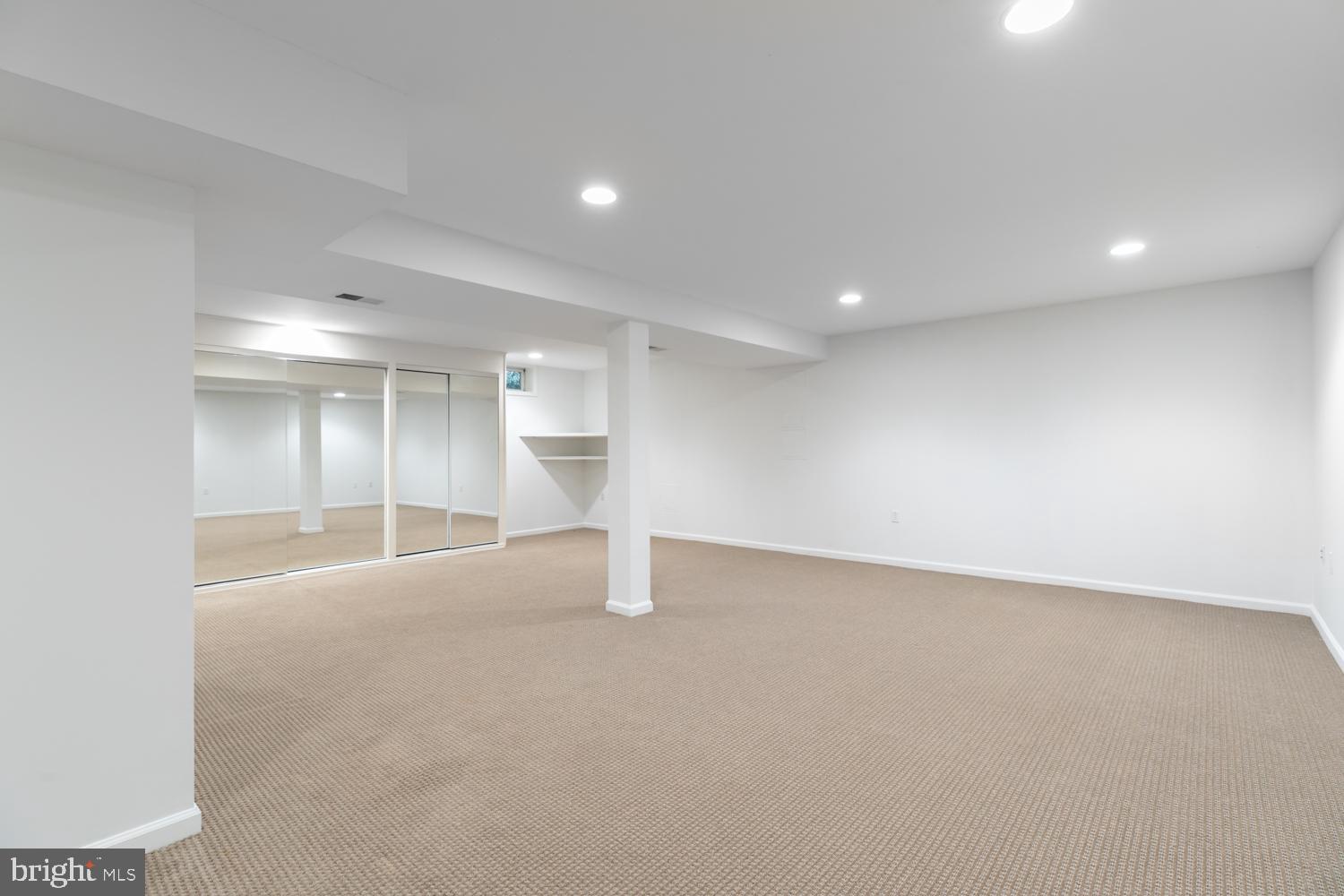 11603 Deer Forest Road Reston, VA 20194 - Photo 30 of 38 an empty room with window and pillar in it