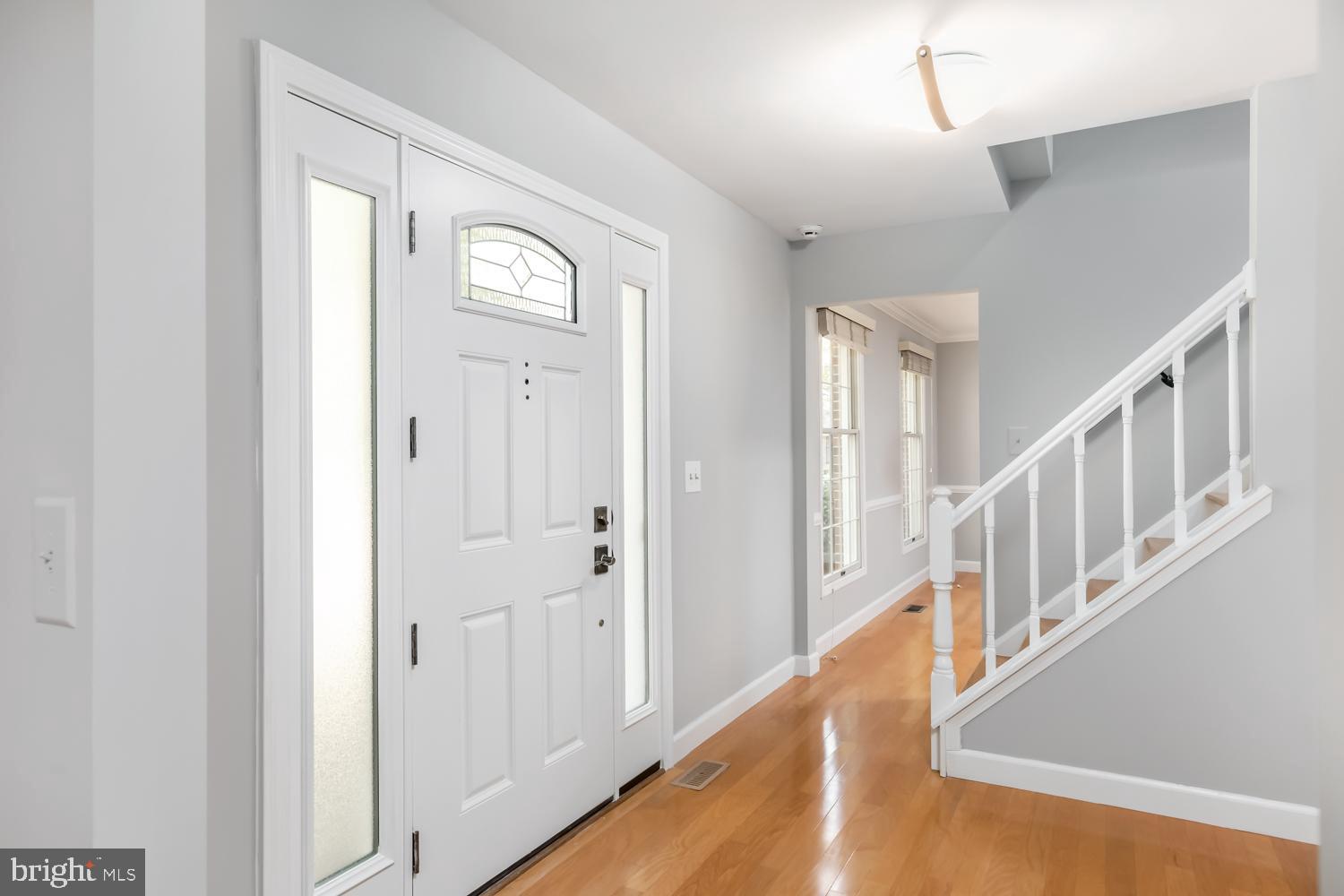 11603 Deer Forest Road Reston, VA 20194 - Photo 3 of 38 a view of an entryway with wooden floor