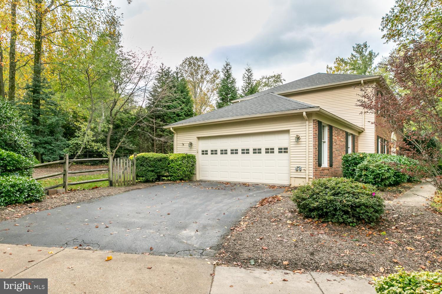11603 Deer Forest Road Reston, VA 20194 - Photo 37 of 38 a view of a house with a yard and fence