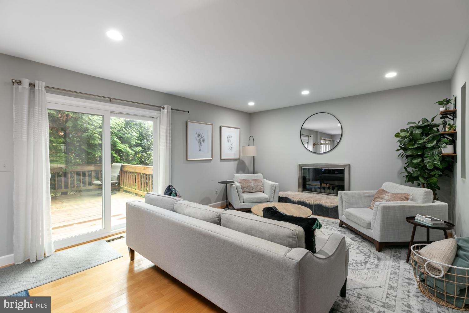 11603 Deer Forest Road Reston, VA 20194 - Photo 9 of 38 a living room with furniture and a large window