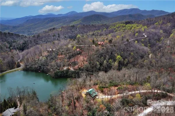 a view of a lake with mountains in the background
