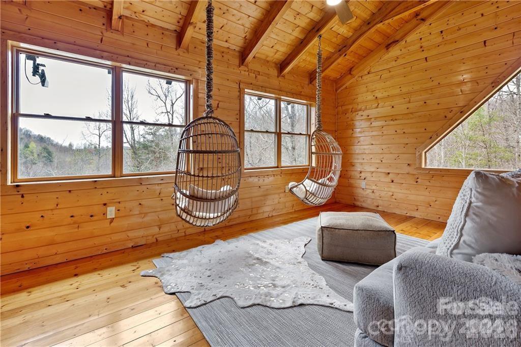 552 Lake Road Old Fort, NC 28762 - Photo 20 of 46 a room with furniture and a large window