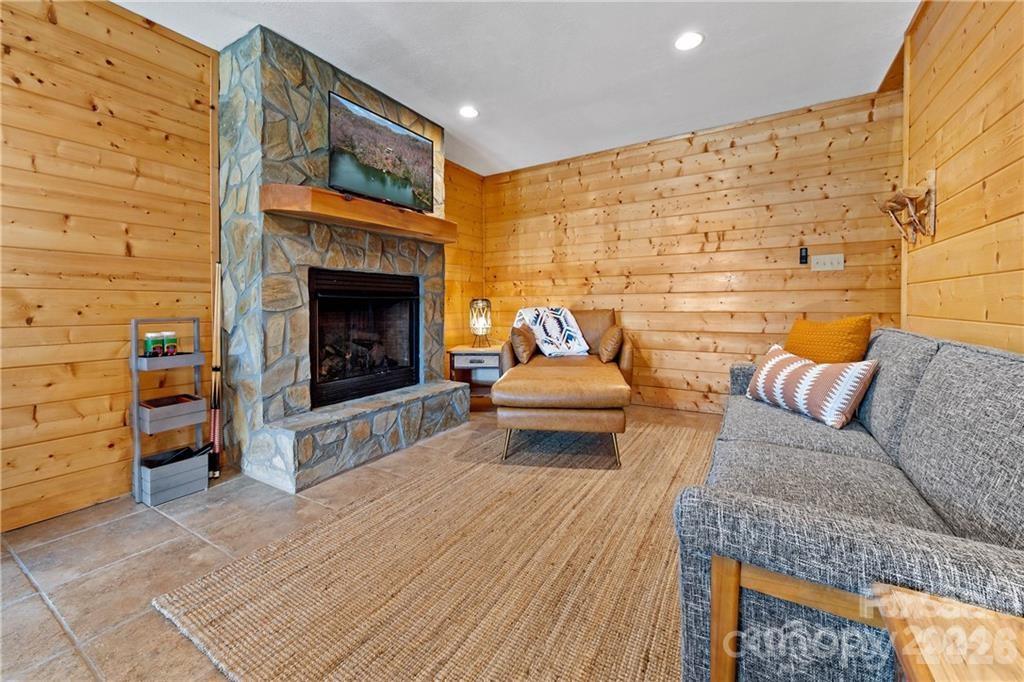 552 Lake Road Old Fort, NC 28762 - Photo 27 of 46 a living room with furniture and a fireplace