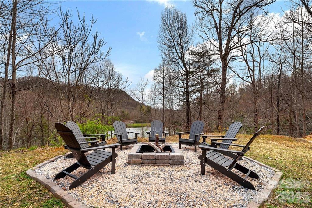 552 Lake Road Old Fort, NC 28762 - Photo 42 of 46 a view of a backyard with a patio