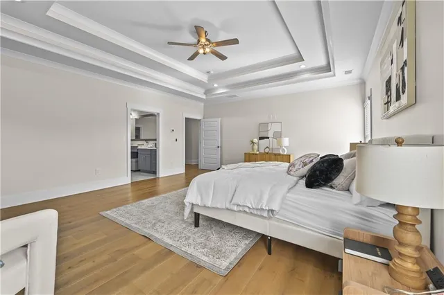 a view of wooden floor and windows in a room