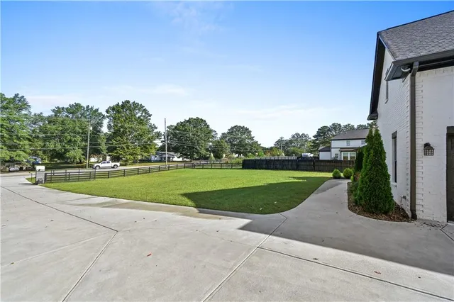 a view of a garden and basketball court