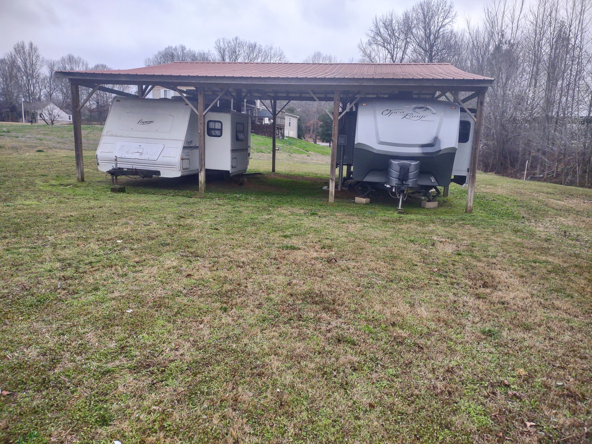 59 Lakeside Lane Decaturville, TN 38329 - Photo 3 of 18 a view of a backyard of the house