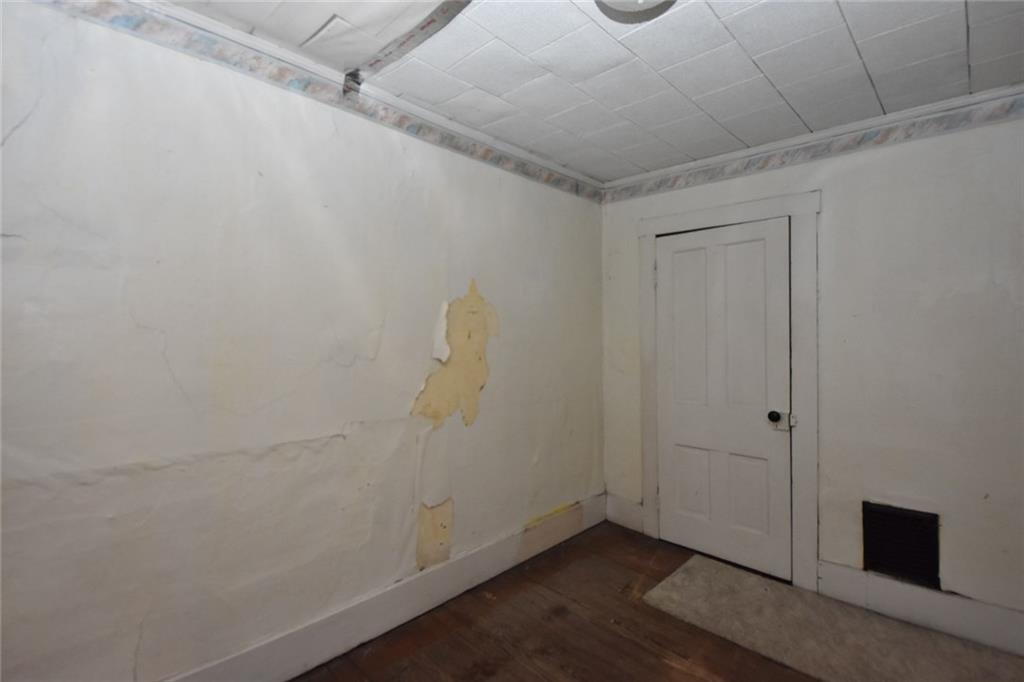1845 Savannah Road New Castle, PA 16101 - Photo 17 of 21 11' x 8' 2nd floor bedroom needs re-finished ceiling and walls. Has a large closet. List price reflects the work that needs to accommodate the remodeling.
