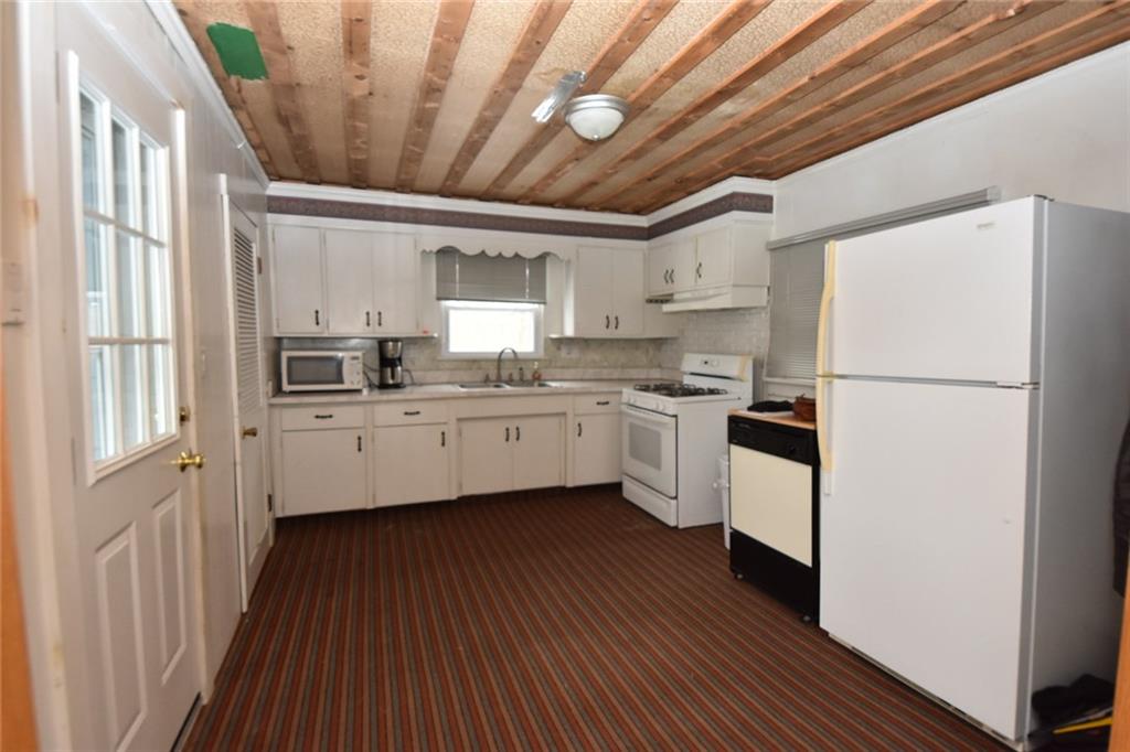 1845 Savannah Road New Castle, PA 16101 - Photo 7 of 21 All the kitchen appliances are included. Note: gas oven needs fixed, range top does work. Ceiling tiles need installed or drywall to complete space. Dishwasher, microwave, & refrigerator are included in the sale.