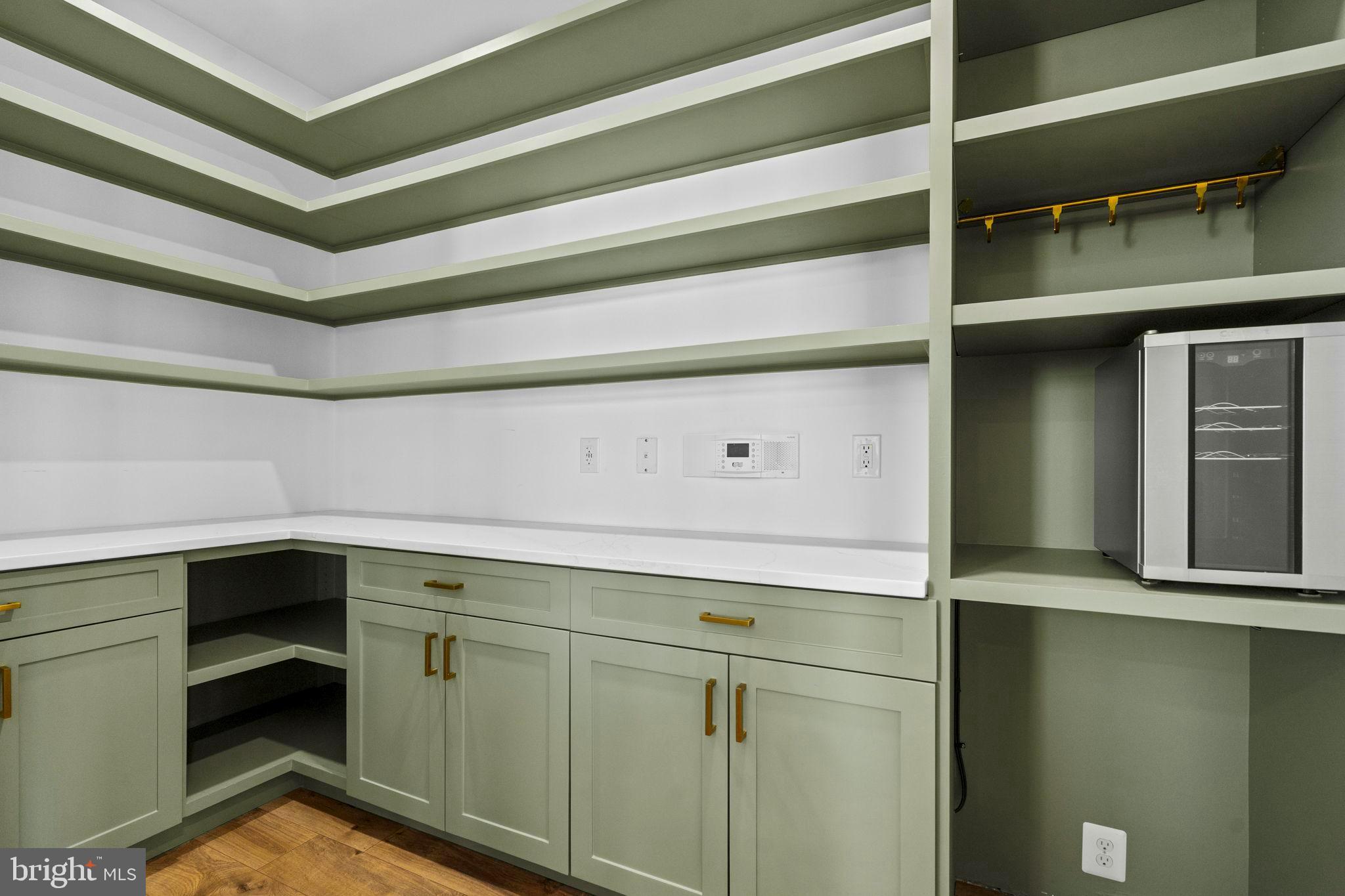 43132 Butterfly Way Leesburg, VA 20176 - Photo 11 of 63 a storage room with cabinets