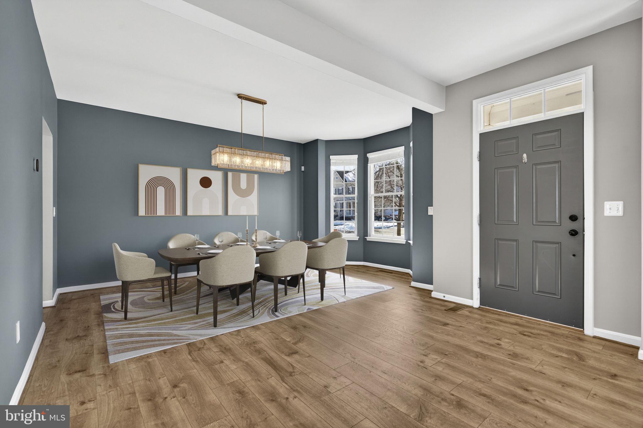 43132 Butterfly Way Leesburg, VA 20176 - Photo 15 of 63 a view of a dining room with furniture and wooden floor