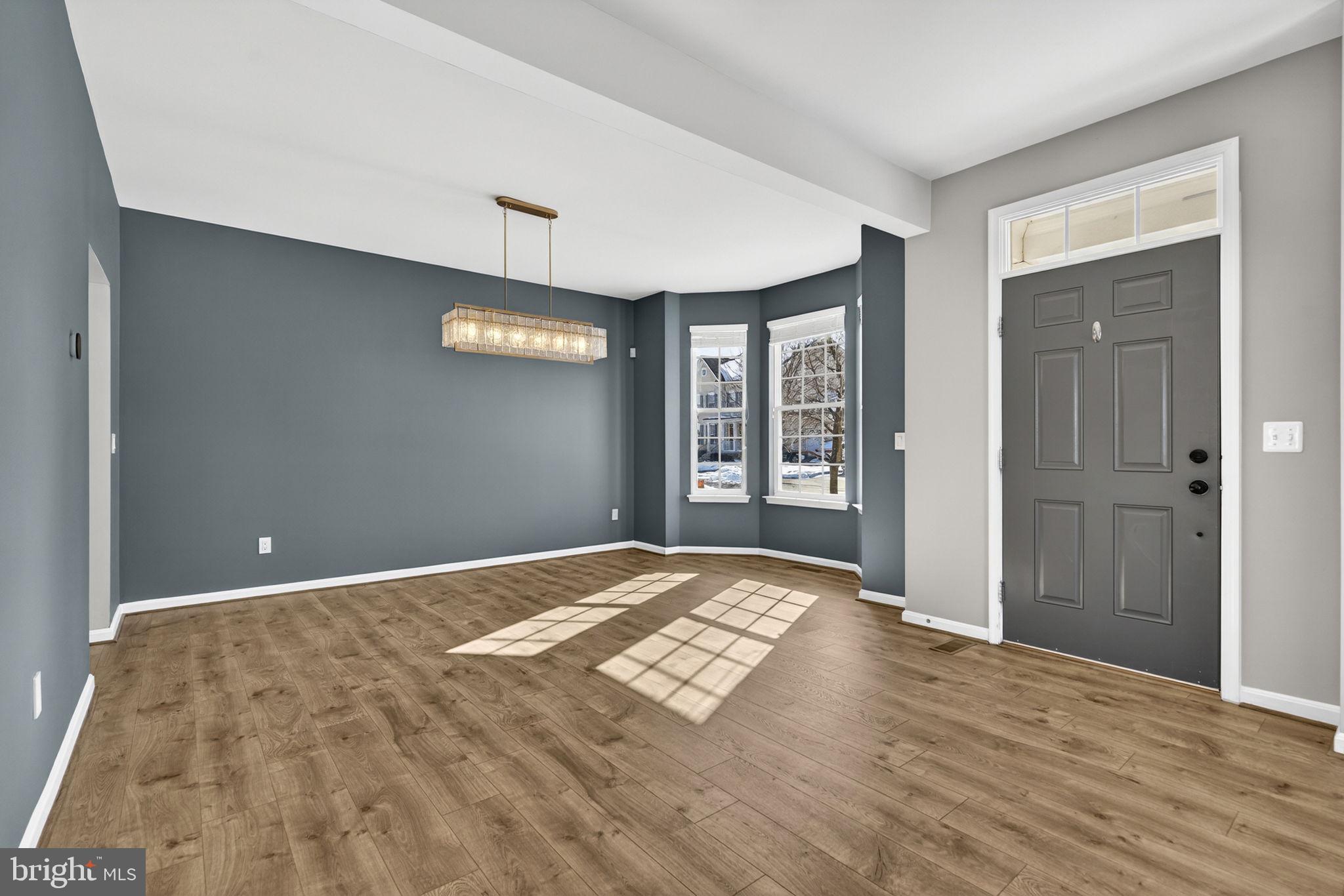 43132 Butterfly Way Leesburg, VA 20176 - Photo 16 of 63 a view of empty room with window and a ceiling fan