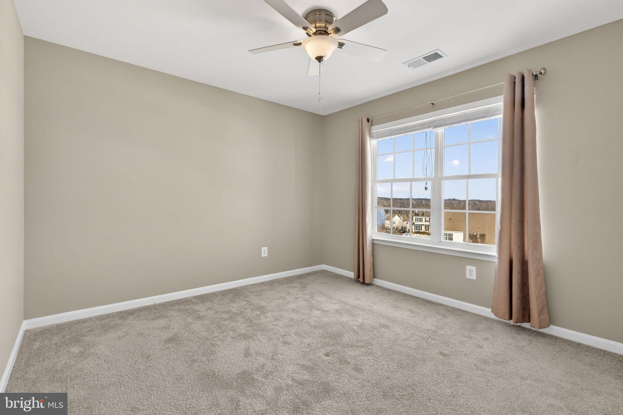 43132 Butterfly Way Leesburg, VA 20176 - Photo 40 of 63 a view of an empty room with a window