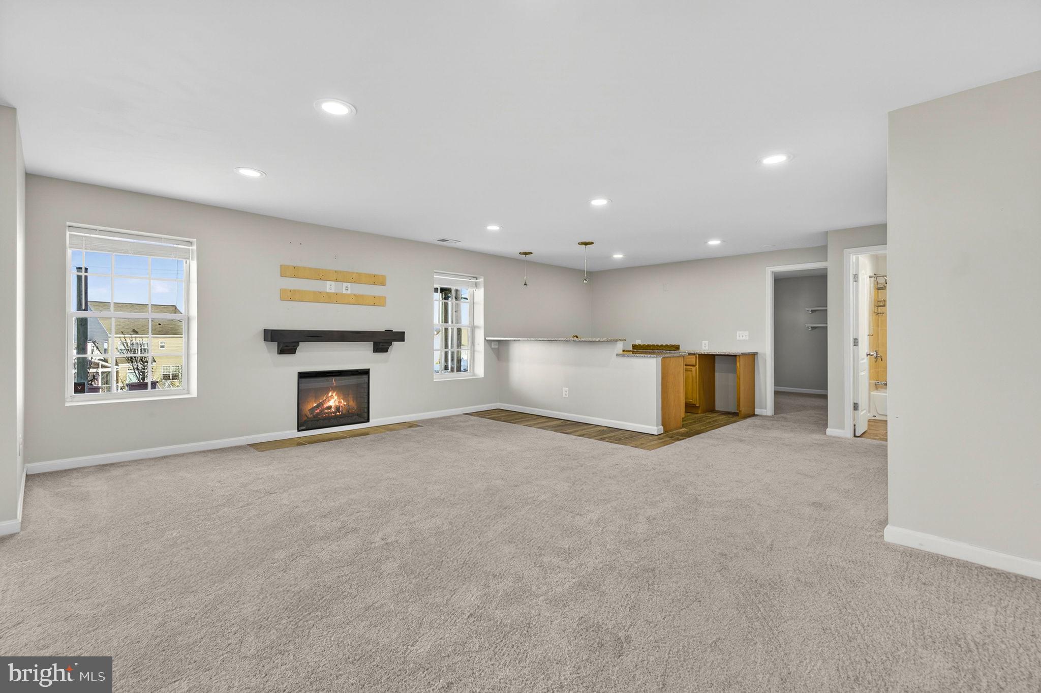 43132 Butterfly Way Leesburg, VA 20176 - Photo 43 of 63 a view of empty room with a fireplace and a window