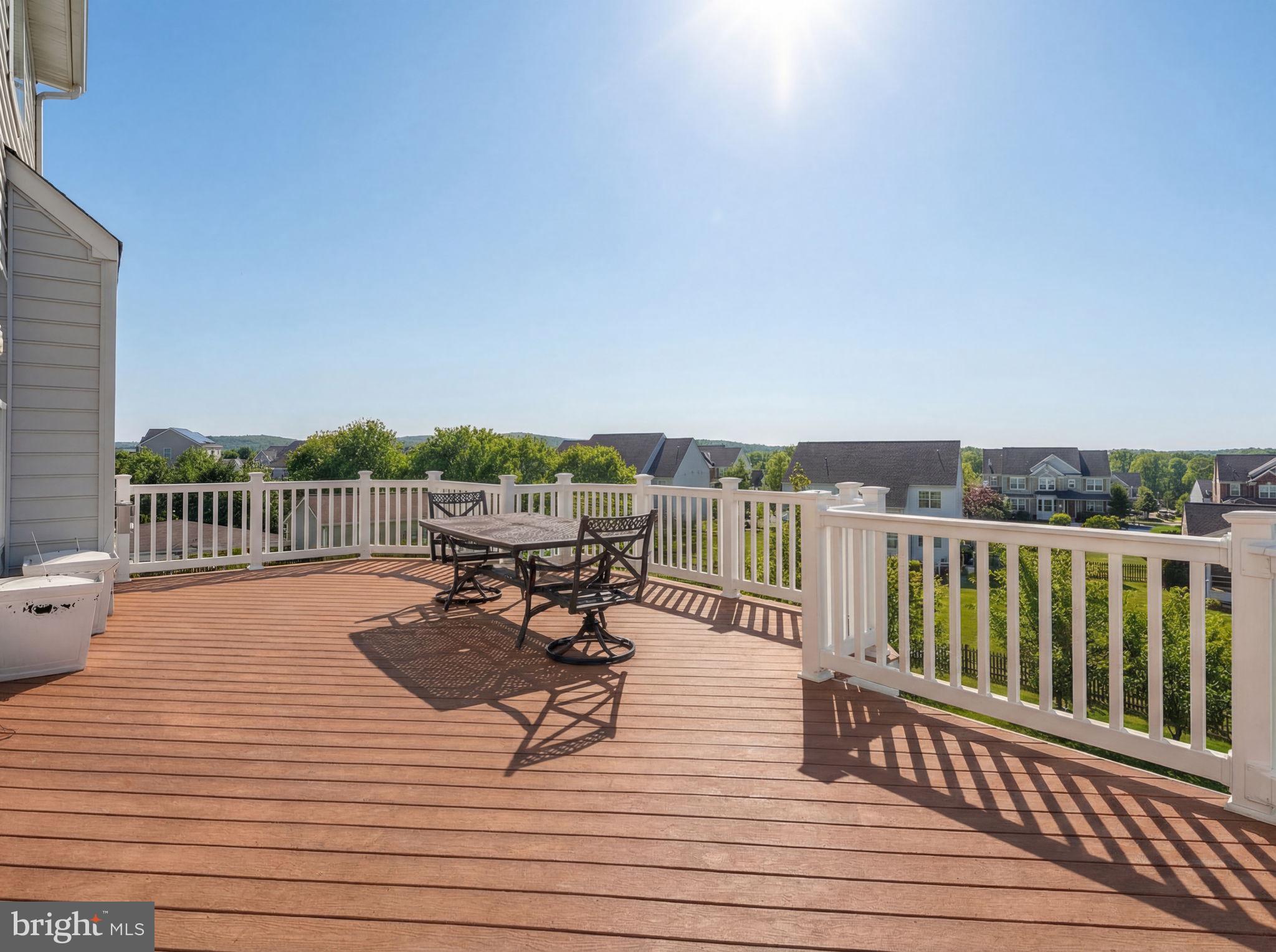 43132 Butterfly Way Leesburg, VA 20176 - Photo 55 of 63 a view of a terrace with wooden floor and outdoor seating