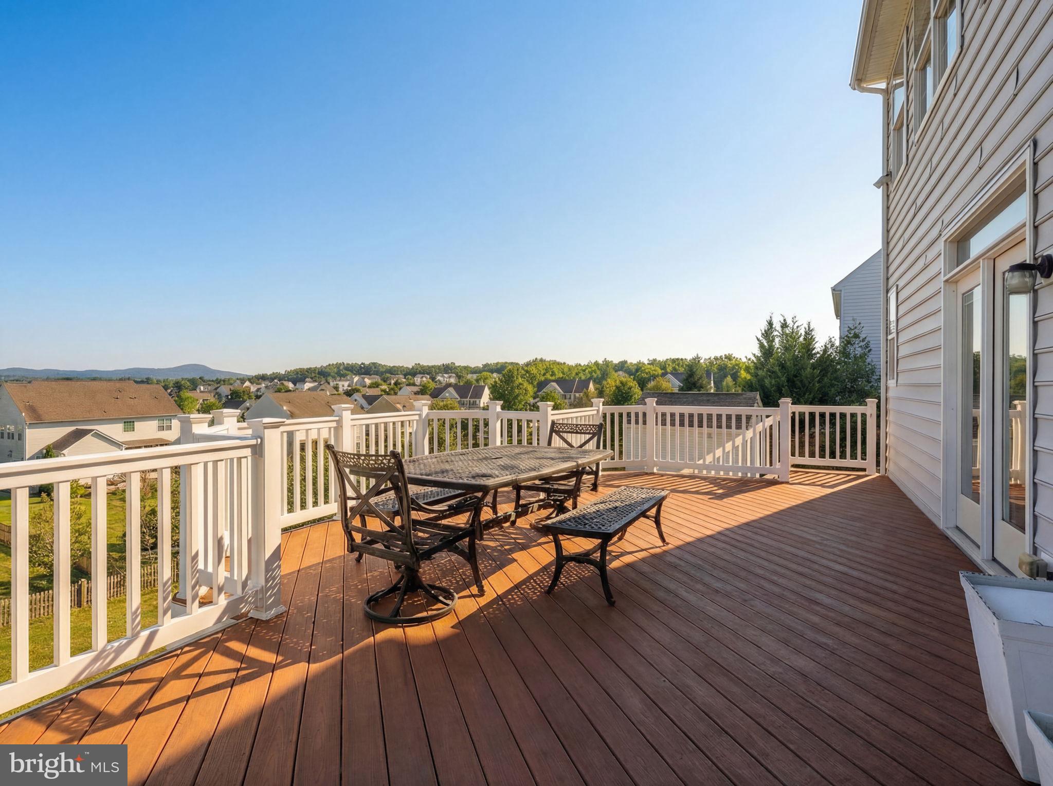 43132 Butterfly Way Leesburg, VA 20176 - Photo 57 of 63 a terrace with outdoor seating and wooden floor