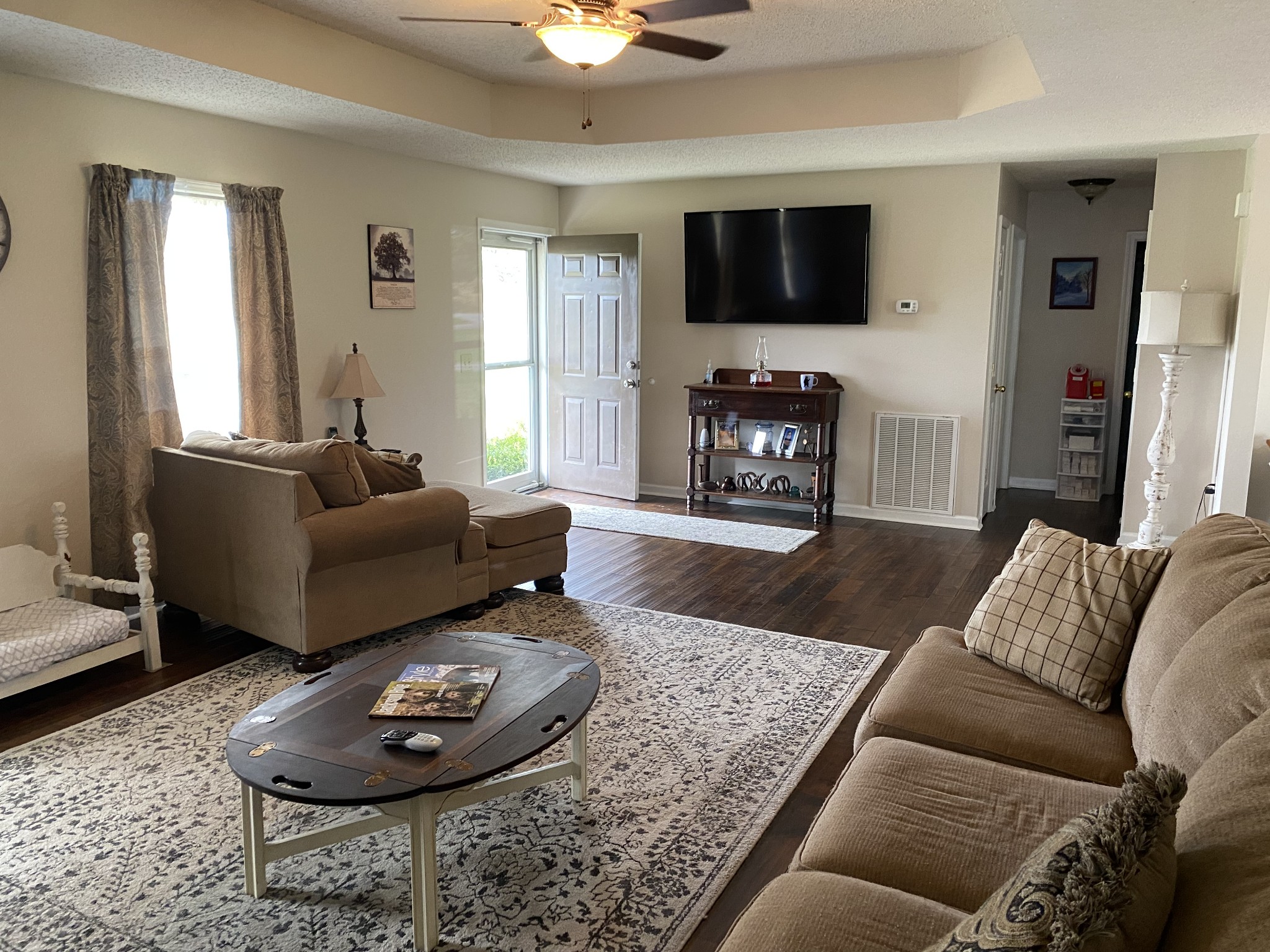 876 Barnette Road Minor Hill, TN 38473 - Photo 3 of 27 a living room with furniture and a flat screen tv