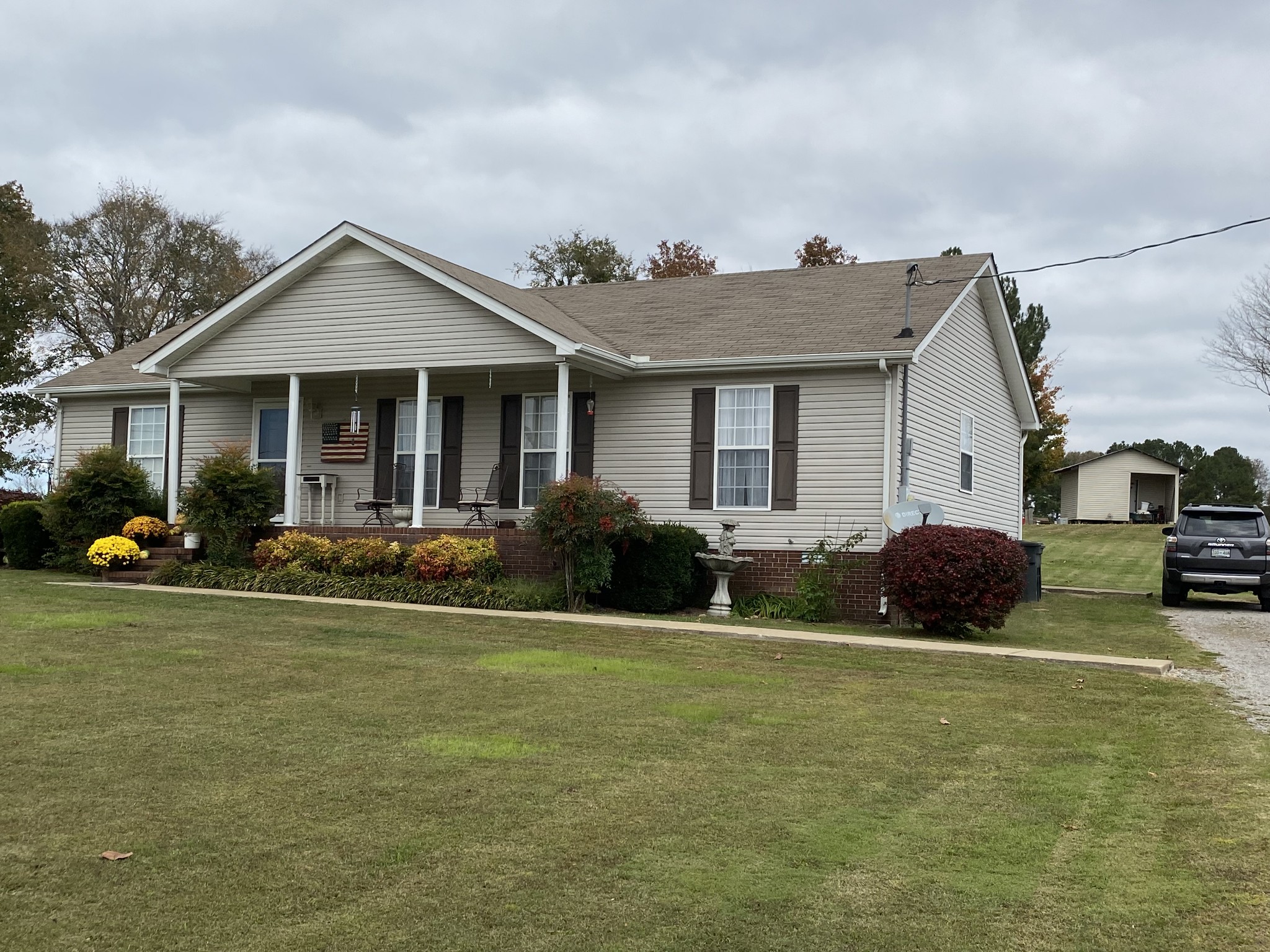 876 Barnette Road Minor Hill, TN 38473 - Photo 27 of 27 a view of a house with a patio