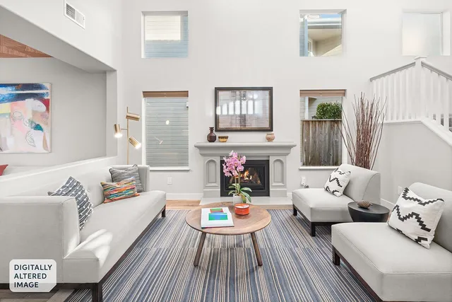 a kitchen with stainless steel appliances granite countertop a sink a stove and a microwave