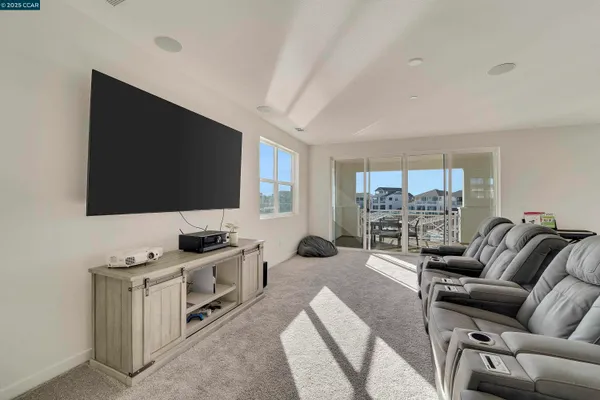 a bathroom with a sink toilet vanity and shower