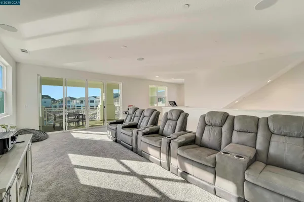 a bathroom with a sink toilet a mirror and shower