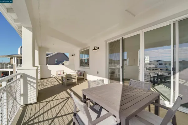 a view of a backyard with furniture