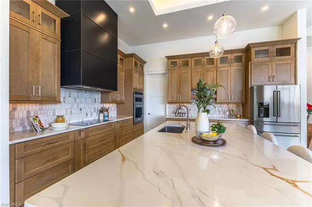 a kitchen with sink and window