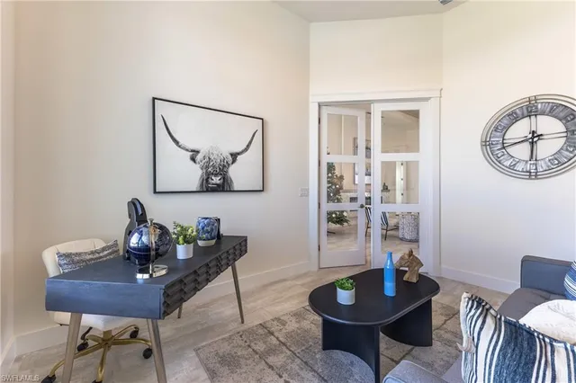 a living room with furniture and a table