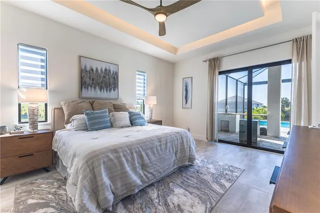 a bedroom with a balcony a bed and a couch