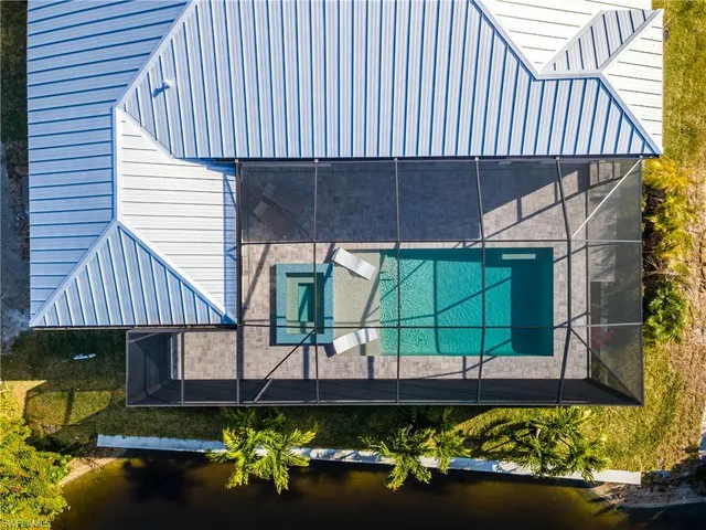 a view of a kitchen with sink and washing machine
