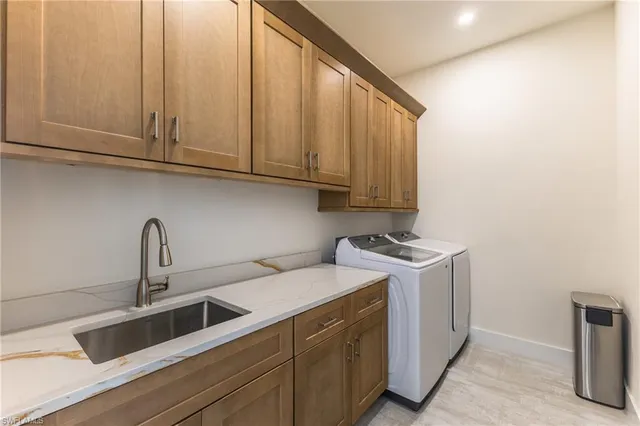 a view of kitchen with granite countertop lots of counter top space