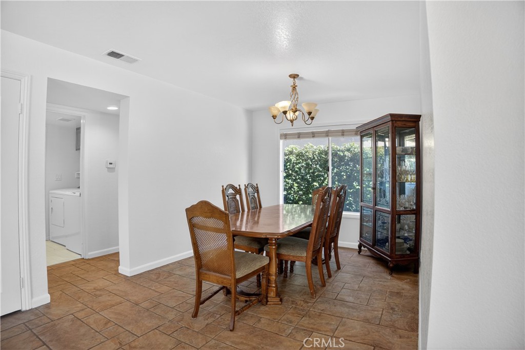 540 Fairfield Road Simi Valley, CA 93065 - Photo 12 of 47 a view of a dining room with furniture window and outside view
