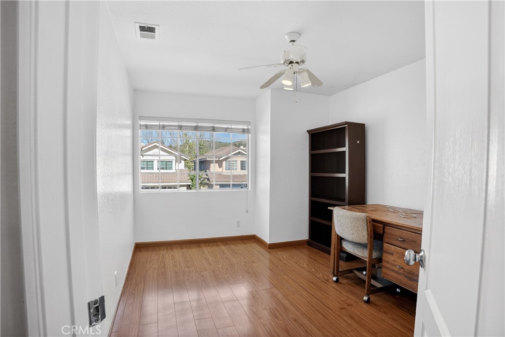540 Fairfield Road Simi Valley, CA 93065 - Photo 29 of 47 a view of a workspace with furniture and a window